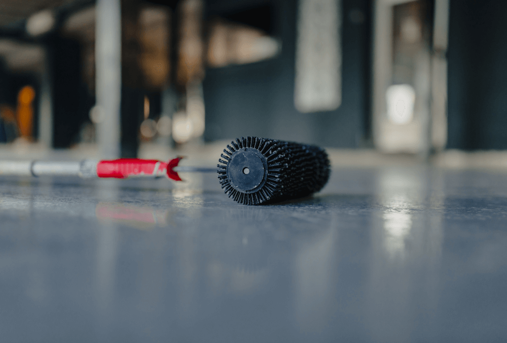 roller tool on a concrete flooring