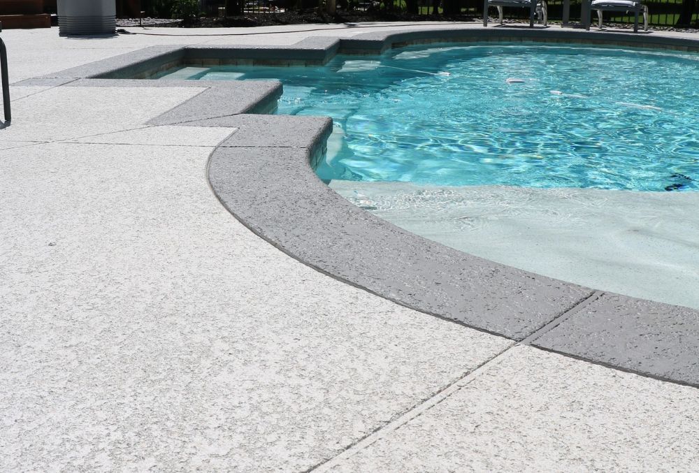 spray knockdown on a pool deck