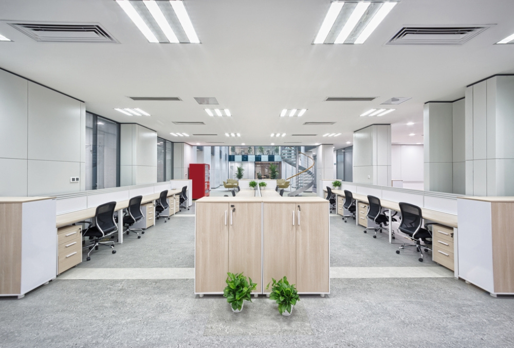 Modern office flooring with decorative concrete or epoxy finish, offering a sleek, durable, and low-maintenance surface for professional spaces.