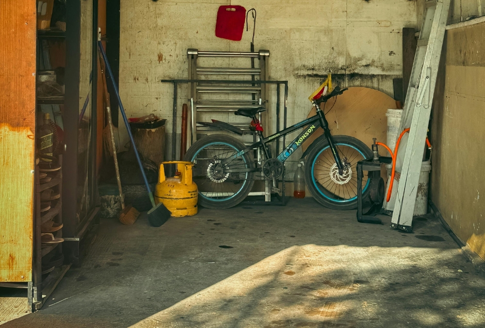 garage with stains on the floor