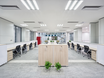 Modern office flooring with decorative concrete or epoxy finish, offering a sleek, durable, and low-maintenance surface for professional spaces.