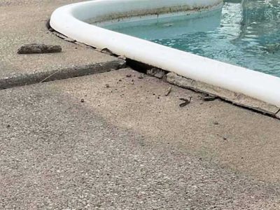 cracked and worn pool deck